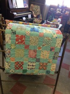 Feed sack quilt.